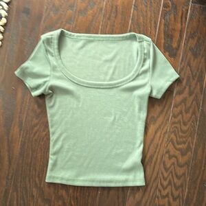 Unknown brand.More than likely size XS length 17 inches, width 10 inches/ green